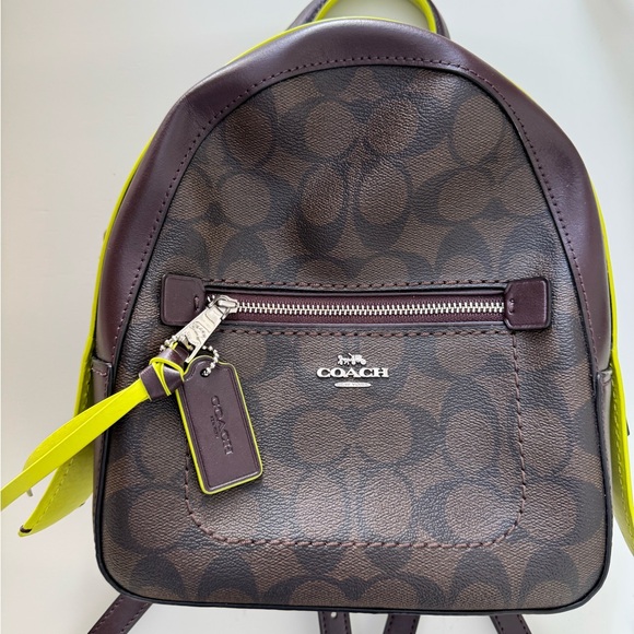 backpack purse coach mini backpack Court In Signature Canvas Refined pebble leather Inside zip cell phone and multifunction pockets Laptop compartment with zip closure Zip closure recycled polyester lining Top handle with 2 drop Outside zip pockets Adjustable shoulder straps Fits a 12 (zip compartment) or 13 (main compartment) laptop 10 3/4 (L) x 14 (H) x 5 1/4 (W) Style No. Coach | Accessories | Coach
